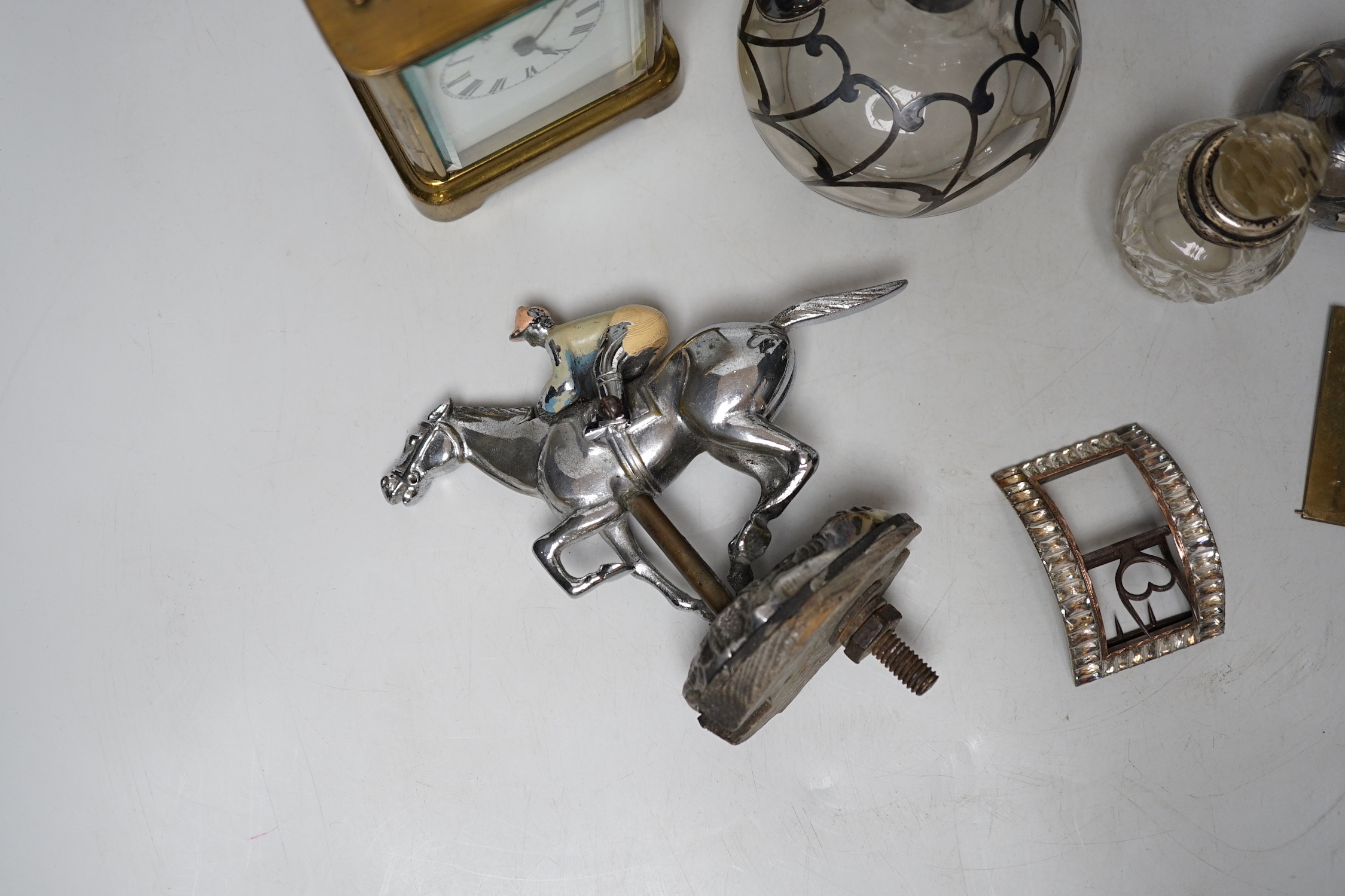 Antique and later objects including Georgian cut steel buckle, car mascot in the form a jockey on horseback, silver overlaid scent bottles and carriage clock with enamel dial